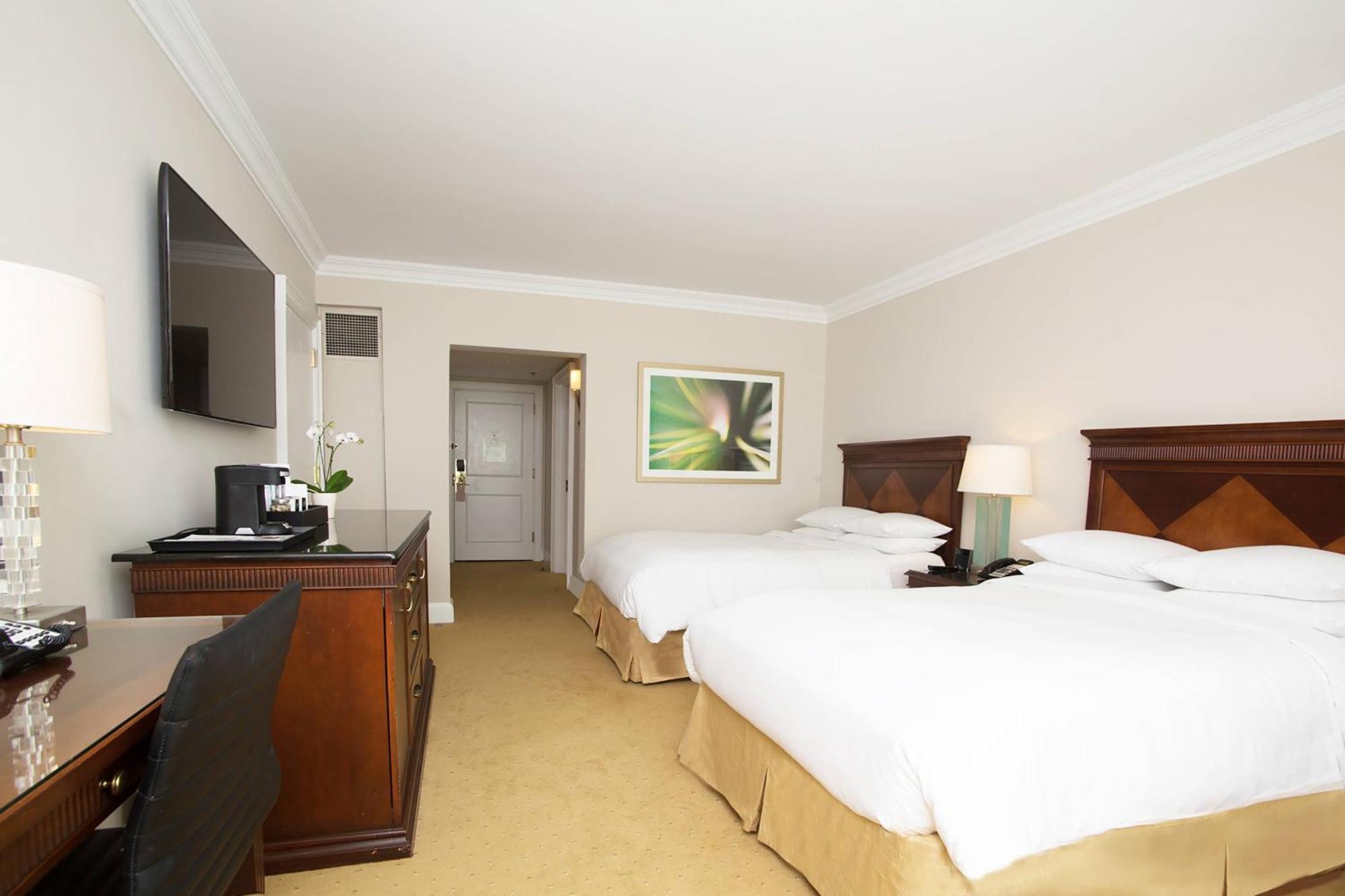 Guest Room with Two Double Beds and City View,1547186953:JPEG